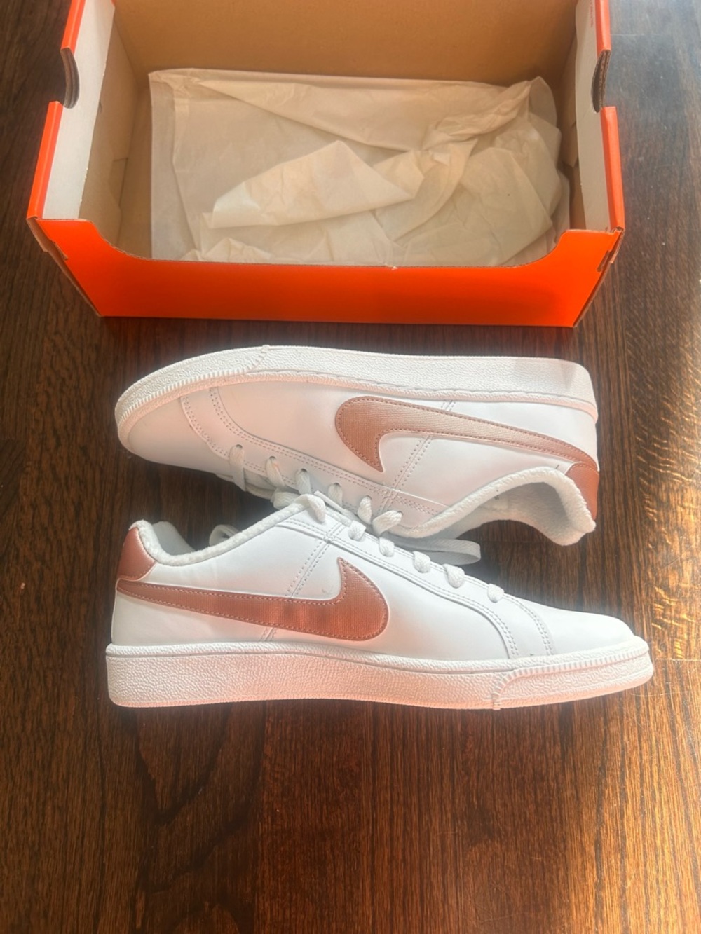 Nike White Sneakers with Metallic Rose Swoosh